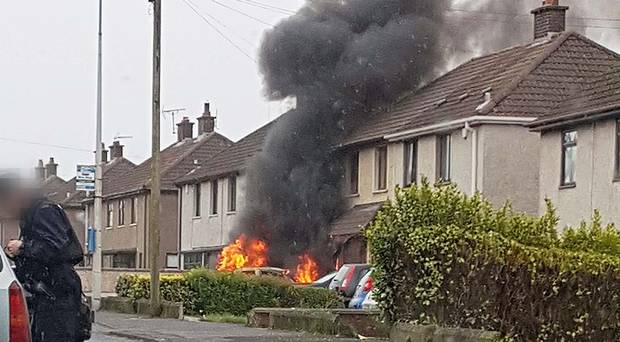 A fire following an incident when a car hit the front of a house in Larne