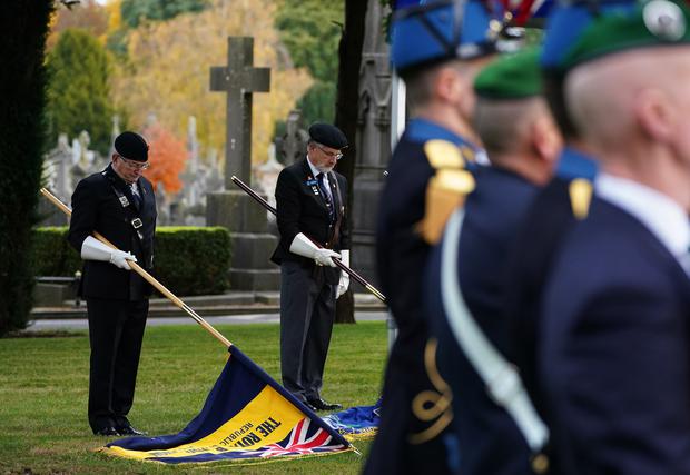 Flagbearers during a ceremony to remember the war dead on Armistice Day at Glasnevin Cemetery in Dublin (Brian Lawless/PA)
